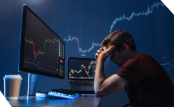 depressed-crypto-investor-of-computer-with-candles-2023-11-27-05-10-40-utc